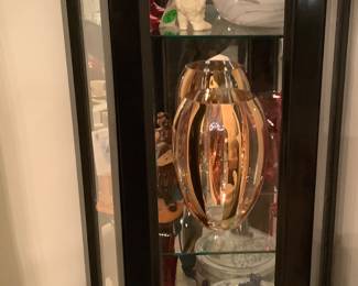 Black corner curio cabinet with lights. Price is: 85.00