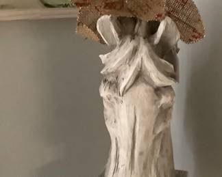 Statue of horse with his Christmas bow.