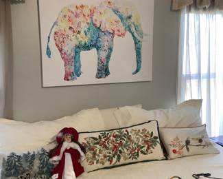 Front of King size bed with elephant on canvas. Price of elephant picture on canvas: $120.00.