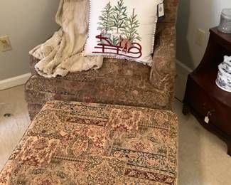 Beautiful club chair with ottoman. Has beautiful colors of blue, burgundy and brown. Price for chair and ottoman is: $160.00.