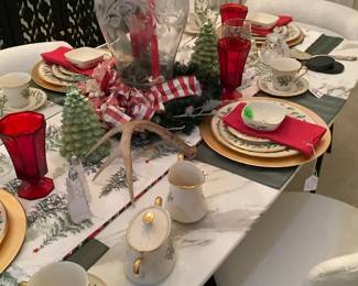 The table has a marble top with and black and gold square bottom. Beautiful. $1;035.00 with the 6 chairs. It is by Kootlena. Table measures: Length 63”x35”x30” tall.