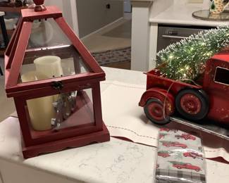 Red wood lantern with candles.