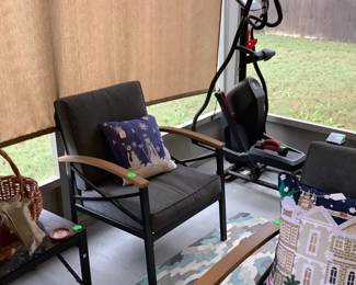 One of the two chairs in sunroom. Price: $90.00 for 2.