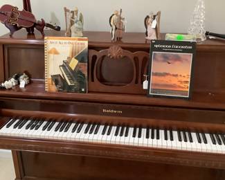 Full picture of the piano with bench. $1,400.00.