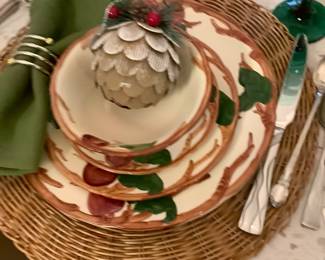 Close-up of Apple dishes with wicker place mats. Price $85.00.
