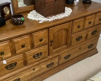 Oak dresser with mirror is: $185.00.