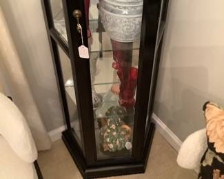 Another corner curio in dining room, lighted and has glass shelves. Also has many beautiful items. Price js: $95.00.