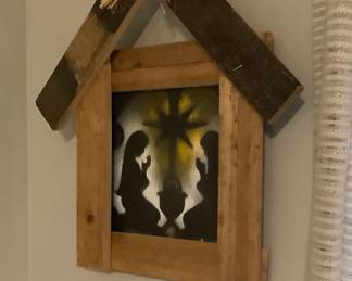 Hand made manger with Jesus.