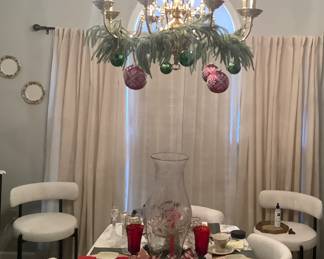 The contemporary dining table with marble top, 6 chairs. Comfortable. Has black and gold pedestal. Price for table and 6 chairs is: $1,035.00. Has 2 captain chairs that is: $280.00 for 2. The table and chairs are by: Kootlena.