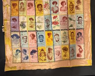  Antique silk stamp album quilt or signature quilt featuring numerous printed images resembling postage stamps, from the early 20th century.