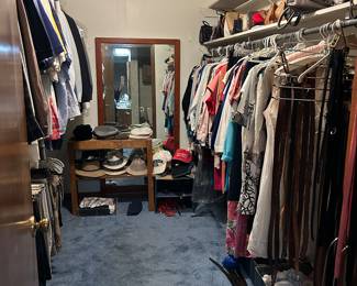 Men's clothes L/XL.  Pants 38/32.  Women's S/M.  Fabulous large wood framed mirror at the back.