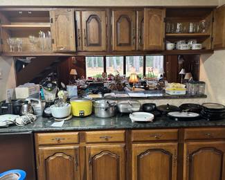 Small appliances and cast iron pieces.