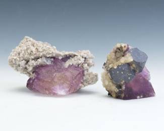 Two Fluorite Crystals with Quartz on Matrix