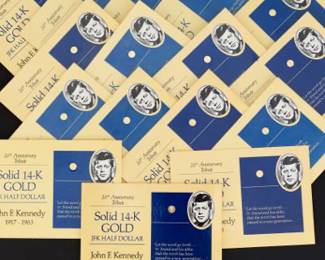 Sixteen 14K Gold Special Issue Miniature Half Dollars