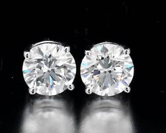 14K Gold Pair of Diamond Earrings