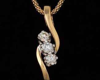 14K Three Diamond Pendant On a Gold Chain