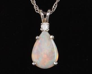 14K White Gold and Opal Pendant On a Gold Chain