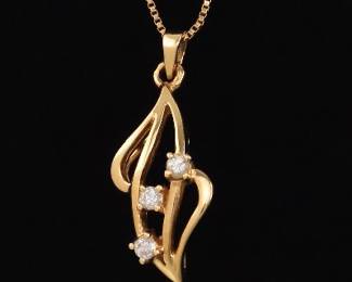 14K Gold Diamond Pendant on a Lengthy Chain