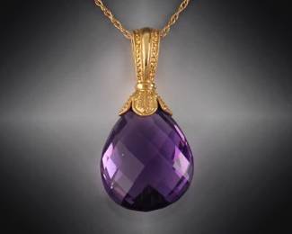 14K Gold Mounted Amethyst On a Chain.