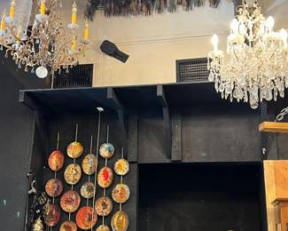 Elegant Schonbek crystal chandelier featuring cascading faceted prisms, scrolling crystal arms, and candle-style lights. Renowned for exceptional craftsmanship and brilliance, this chandelier offers timeless luxury and dramatic sparkle. Ideal for refined interiors or statement lighting. Condition consistent with age. All items sold as-is.