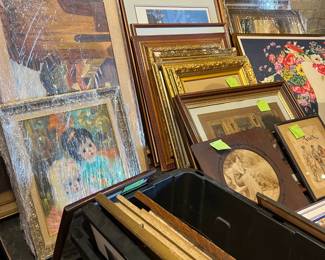 Large assortment of framed artwork and prints in various sizes and styles. Includes vintage and decorative frames in wood and gilt finishes, with landscapes, portraits, florals, and mixed subjects. Ideal for collectors, decorators, or resale. Selection shows depth and variety available at the sale.