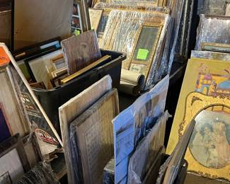 Large assortment of framed artwork, prints, photographs, and posters stacked and ready for browsing. Includes landscapes, decorative prints, vintage photographs, and sports ephemera in a variety of frames and styles. A true treasure-hunt selection ideal for collectors, decorators, and resellers. All items sold as-is.