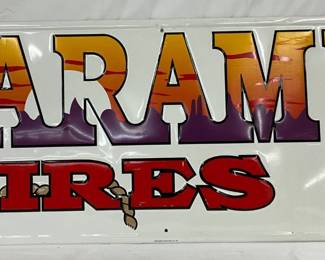 Emb. ‘Laramie Tires’ Metal Sign by Scioto Signs, 1995, 48×18in.