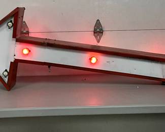 Large DS Arrow Sign with Blinking Yellow and Red Lights