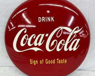 16-Inch Metal Coca-Cola Button Sign “Sign of Good Taste”
