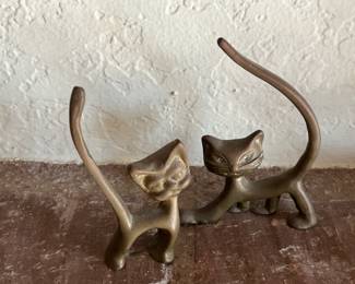 Mid Century brass cats.