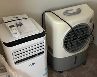 Portable room air conditioner and fans.