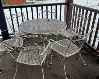 Metal outdoor table with chairs