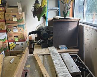 Table saw, miter saw, rooster and flower yard art