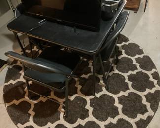 Card table with four folding chairs