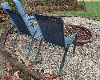 R56 - $20 ALL 4. Metal & Mesh stacking chairs. Need a good cleaning but no holes/rips etc.