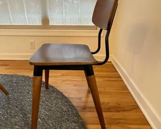 R36 - $600 SET. CB2 Table Measures 4' across x 30.25" tall. 4 Vega Dining chairs in very good vintage condition! Purchased over 20 years ago at a boutique furniture store in CT. Glass has some minor scratches from use but very good condition.