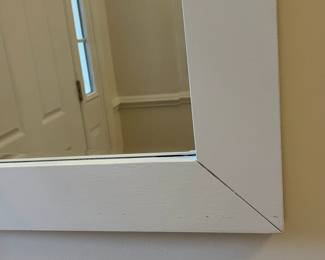 R37 - $30. Wall Mirror with painted white frame. Measures 30.5" x 40.5".