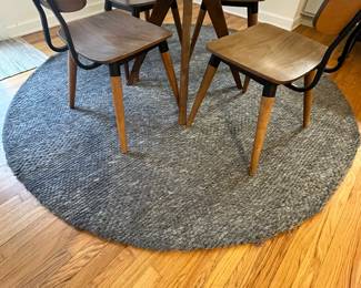 R39 - $50. 7' Round Wool Safavieh "Marbella" Rug. Does show some signs of wear but lots of life left!