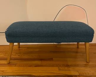 R44 - $40. Blue Bench. Measures 38" x 15.5" x 15.5" tall. Wooden Legs and upholstered top. Sturdy and in very good condition!