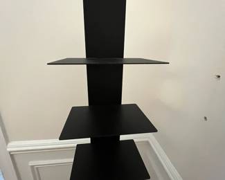 R33 - $40. Black Spine Bookcase. Metal. In very good condition.