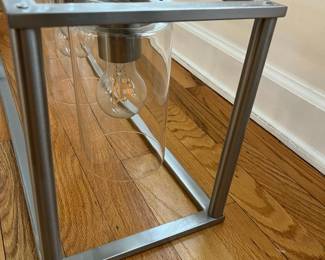 R15 - $50. Pendant Light. Measures 41" wide x 8.5" deep x 35" tall. Brushed Nickel. Works just switched out for a different style.