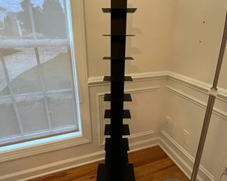 R33 - $40. Black Spine Bookcase. Metal. In very good condition.