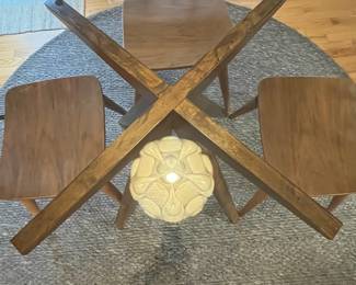 R36 - $600 SET. CB2 Table Measures 4' across x 30.25" tall. 4 Vega Dining chairs in very good vintage condition! Purchased over 20 years ago at a boutique furniture store in CT. Glass has some minor scratches from use but very good condition.
