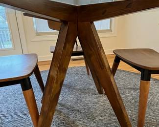 R36 - $600 SET. CB2 Table Measures 4' across x 30.25" tall. 4 Vega Dining chairs in very good vintage condition! Purchased over 20 years ago at a boutique furniture store in CT. Glass has some minor scratches from use but very good condition.