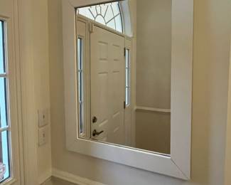 R37 - $30. Wall Mirror with painted white frame. Measures 30.5" x 40.5".