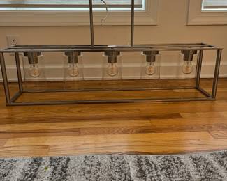 R15 - $50. Pendant Light. Measures 41" wide x 8.5" deep x 35" tall. Brushed Nickel. Works just switched out for a different style.