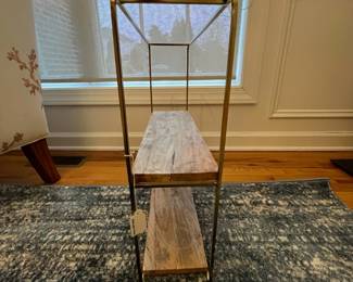 R34 - $20. Metal Wall Shelf. Measures 20" wide x 4.25" deep x 20.25" tall.