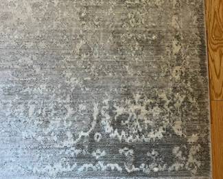 R42 - $60. Safavieh "Valencia" 9' x 12' area rug. Polyester. Had a king bed on top so there is more wear around the edges than the middle.