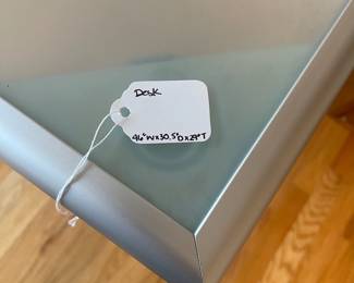 R50 - $95. IKEA Vika Lauri Frosted glass desk with hairpin legs. Legs can be removed for transport if needed. Measures 46" x 30.5" x 29" tall.