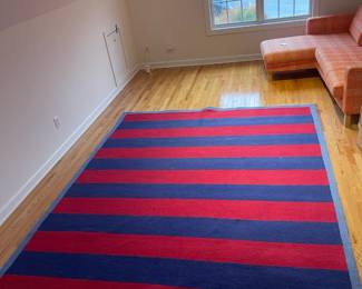 R46 - $75. Pottery Barn Kids "Rugby Stripe" area rug. 100% wool. Measures 120" x 97". Very good condition!